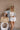 Demi Natural Straw & Cognac Shoulder Purse - front view on model's wrist