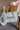Summer Aqua & Orange Tote Bag - front view held by model