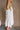 Haisley White Textured Floral Halter Mini Dress- close up side view