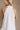 Haisley White Textured Floral Halter Mini Dress- close up top back view