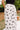 Marlene Black & Cream Polka Dot Midi Dress - up close of skirt