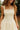 Kiarra Yellow Floral Pleated Mini Dress - close upper front view