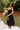 Genevieve Black Corset Midi Dress - full body front view - holding flowers