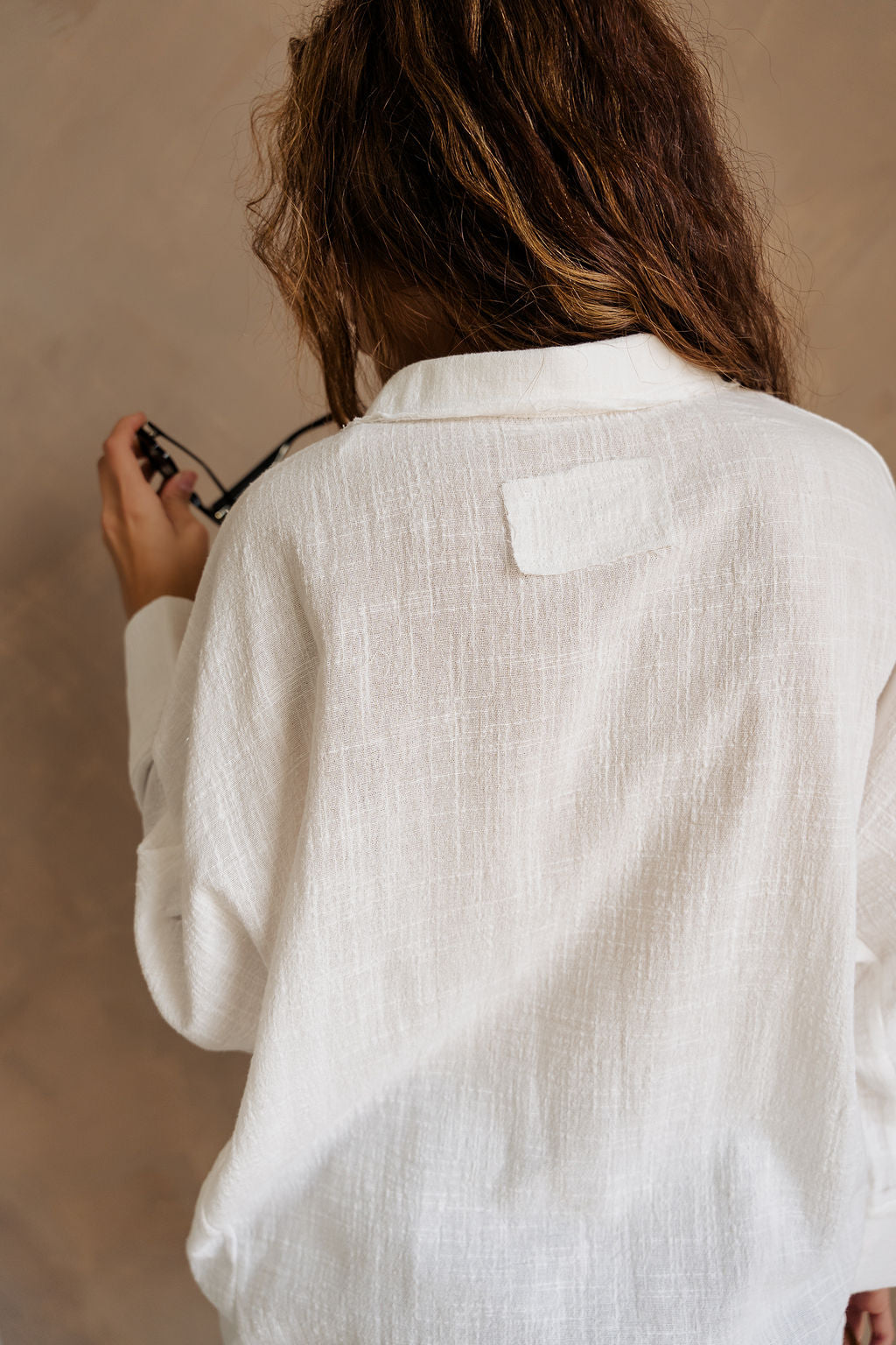 Hazel White Linen Button-Up Long Sleeve Top- close up back view