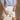 Phoebe White Pleated Shorts- frontal side view