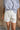 Phoebe White Pleated Shorts- top view