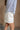 Phoebe White Pleated Shorts- side view