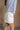 Phoebe White Pleated Shorts- side view