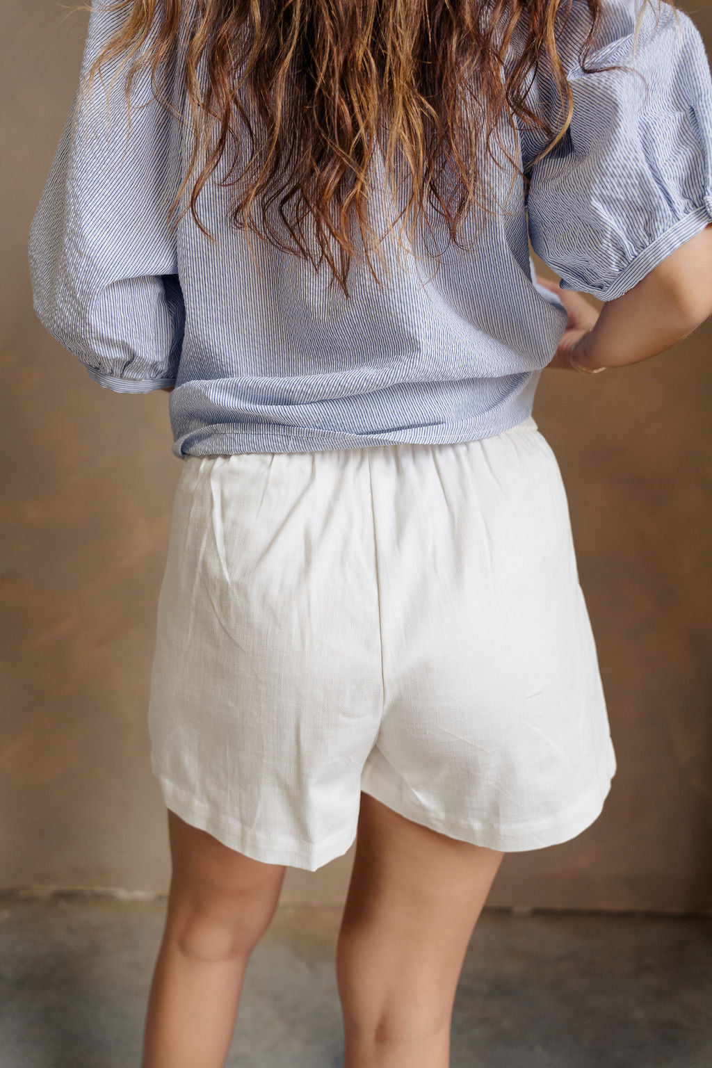 Phoebe White Pleated Shorts- back view