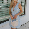 front  view of female model wearing the Amalia Light Blue Rose Bow Mini Dress which features Blue and White Rose Floral Print, Blue Lining, Mini Length, Plunge Neckline, Sleeveless, Back Bow Detail, Back Cutout and Monochrome Back Zipper with Hook Closure