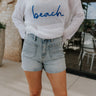 Front view of female model wearing the Alyssa Light Wash Denim Shorts which features Stretchy light denim, Front & back pockets and Front zipper & button closure