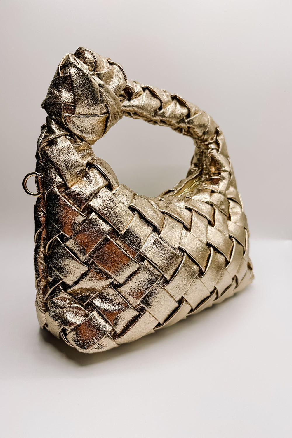 Front view of the Josie Gold Crinkle Braid Purse which features gold crinkle fabric, braided purse and  zipper closure 