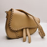 Front view of the Sloane Sand Leather Braided Strap Purse which features tan leather fabric, braided details, gold clasp closure, braided strap, tan lining and curvy hem shape