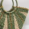 Front view of the Aurora Olive & Natural Woven Tote which features sage and natural woven braided fabric, gold thread details, round handles and sag lining