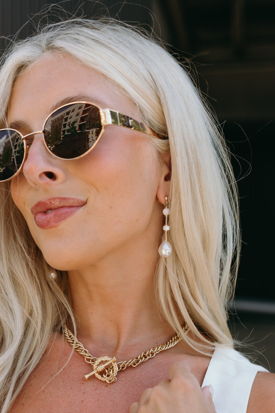 Morgana Pearl Dangle Earrings - side view on model
