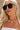 Regan Sunglasses in Black - close up view on model