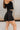 Camila Black Tennis Flare Skort- close up side view