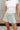 Camila Sage Tennis Flare Skort- close up top view