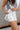 Camila Off White Tennis Flare Skort- frontal right side view