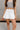 Camila Off White Tennis Flare Skort- front close up view