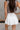 Camila Off White Tennis Flare Skort- close up back view