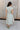 Lizzie Sage Green Knit Midi Dress - full body back view