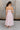 Karsyn Light Pink Strapless Flare Midi Dress- full body back view