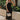 Full body view of female model wearing the Mila Black Knit Cut-Out Trim Midi Dress which features Black Knit Fabric, Square Neckline, Straps and Cutout Details