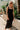 front view of female model wearing the Mila Black Knit Cut-Out Trim Midi Dress which features Black Knit Fabric, Square Neckline, Straps and Cutout Details