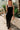 close up front view of female model wearing the Mila Black Knit Cut-Out Trim Midi Dress which features Black Knit Fabric, Square Neckline, Straps and Cutout Details