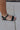 side view of the Laila Gold Chain Anklet which features adjustable gold chain link