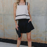 Front  full body view of Sadie Textured Tank in cream with black wavy trim details throughout.