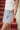 Teagan Light Denim & Lace Bow Skort- close up frontal side view