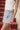 Teagan Light Denim & Lace Bow Skort- close up frontal side view