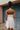 Grace White Eyelet Flare Mini Dress- back view