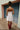 Grace White Eyelet Flare Mini Dress- full body back view