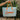 Summer Aqua & Orange Tote Bag - front view of model holding in front of palm leaves