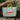 Summer Aqua & Orange Tote Bag - front view of model holding in front of palm leaves