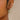 Molly Floral Beaded Huggie Earrings - close up of earrings on model