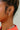 Tiana Gold & Pearl Criss Cross Earrings - close up of earrings on model