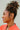 Tiana Gold & Pearl Criss Cross Earrings - side view of earrings on model
