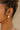 Sami Hammered Gold Hoop Earrings - close up of earrings on model