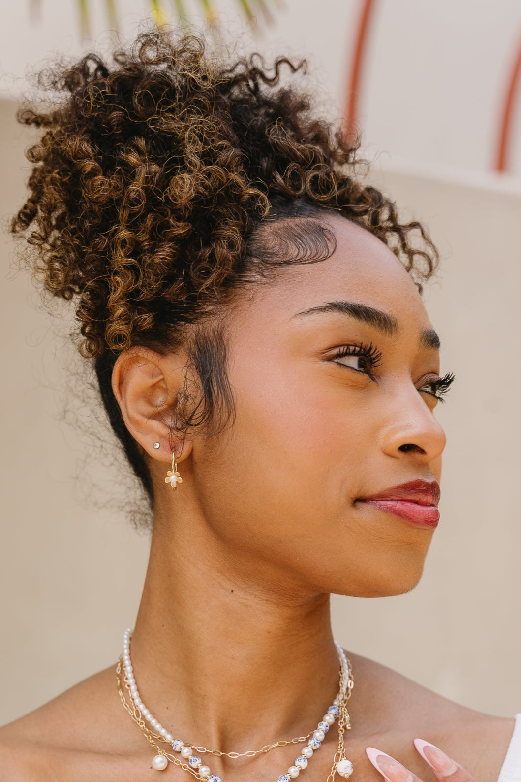 Yasmin Flower Hoop Earrings- side view on model