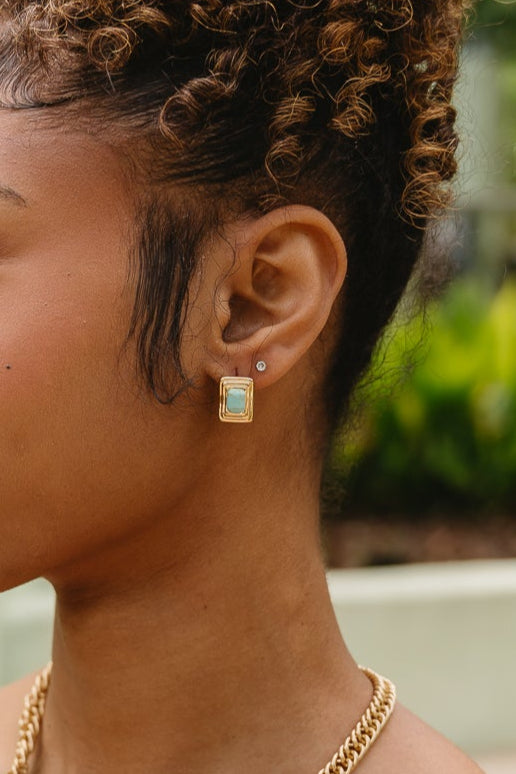 Giselle Gold & Turquoise Earrings - close up of earrings on model