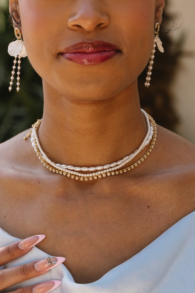 Tessa Layered Gold & Pearl Necklace - close up view on model
