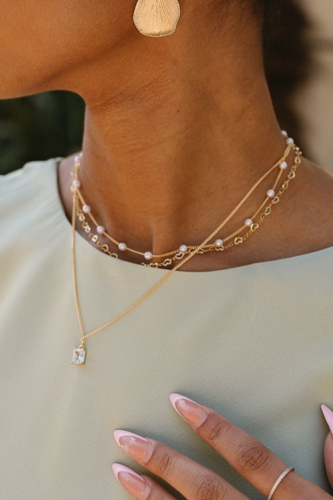 Sarah Layered Gold & Pearl Necklace - close up view on model
