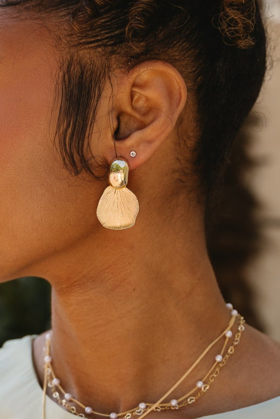Ariel Gold Petal Earrings - close up on model