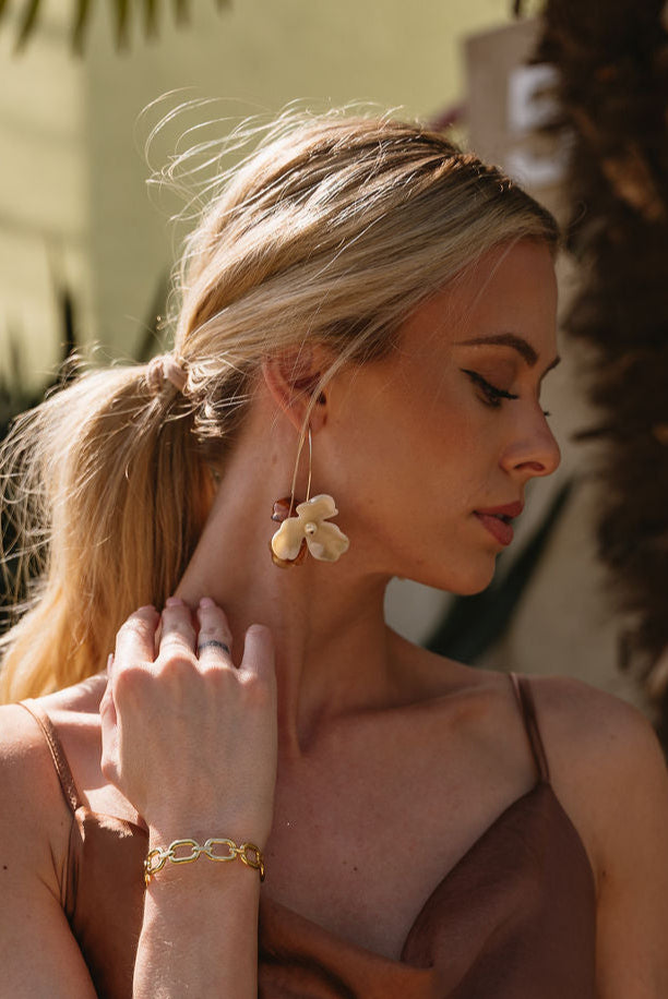 Leila Beige & Brown Flower Earrings - front  view of model wearing earrings