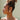 Paloma Twisted Pearl Earrings - side view of model wearing earrings