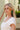 Jana Green Beaded Circle Earrings - side view of model wearing earrings